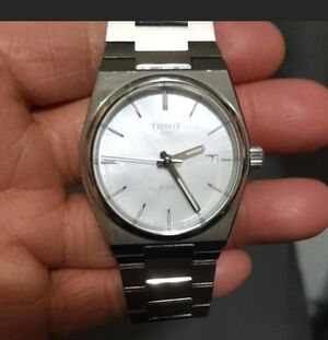 Tissot Stainless Steel Watch with White Face